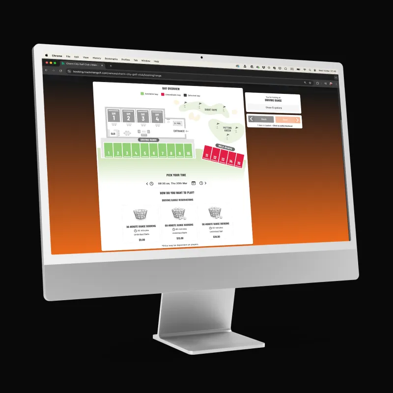 Computer monitor displaying a website with interactive elements, shopping cart details, and colorful navigation on a gradient background.